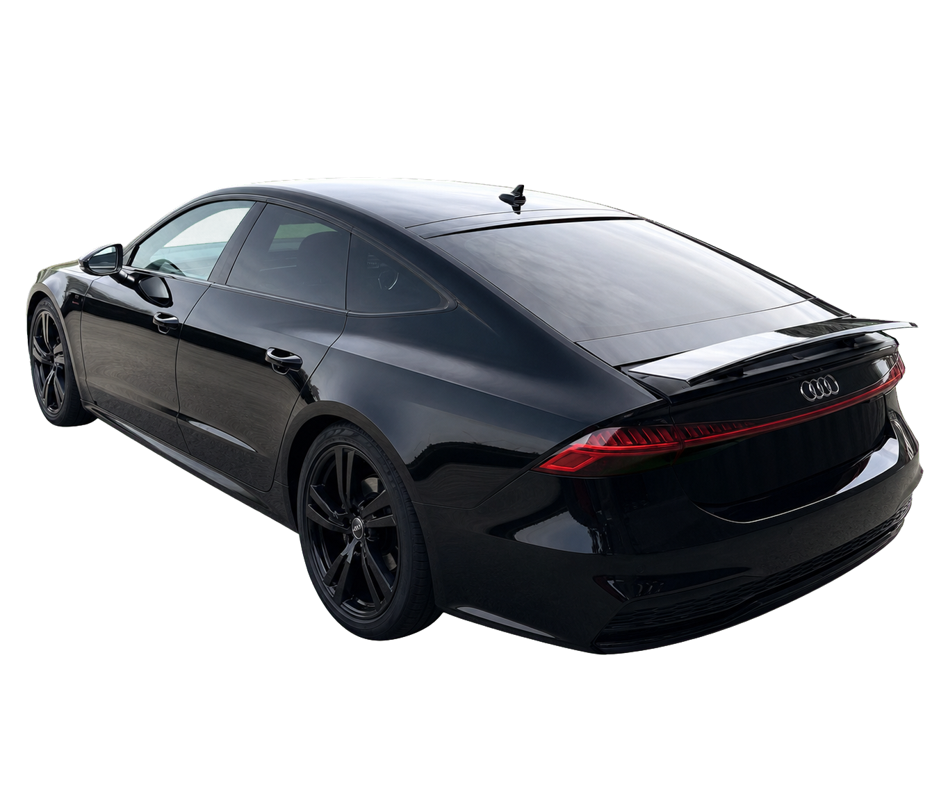 Black Audi A7 rear three-quarter view