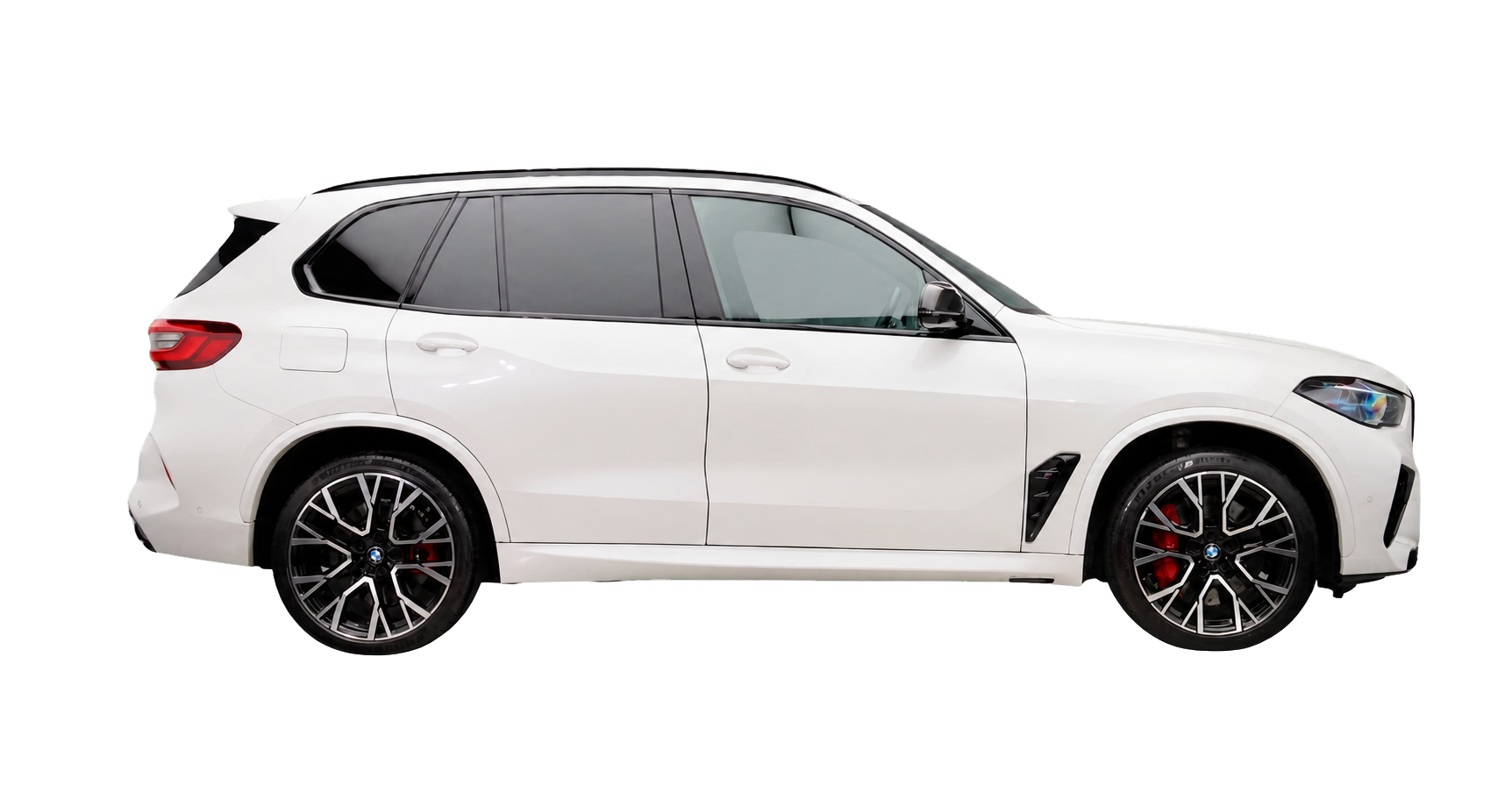 White BMW X5M in side profile