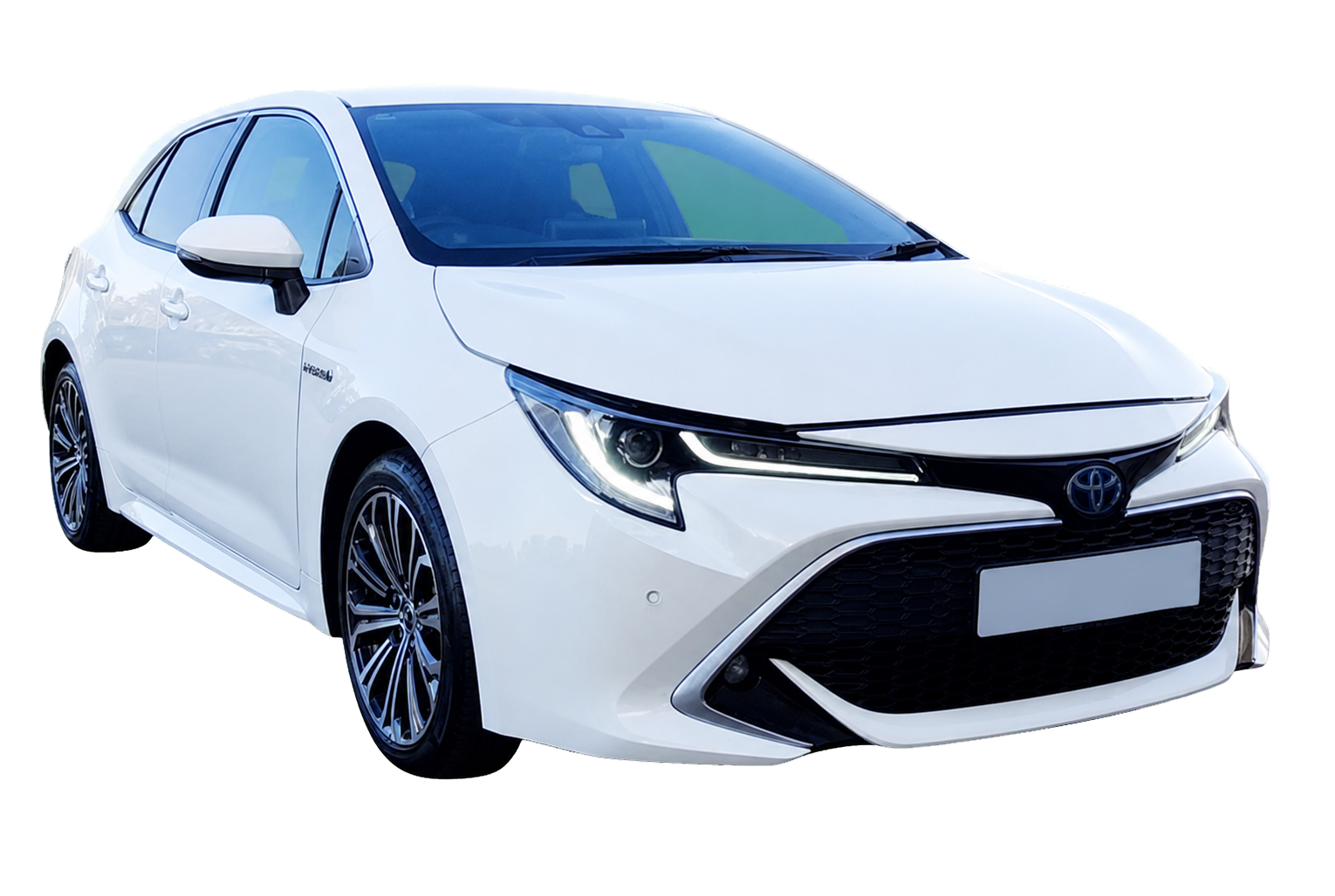 White Toyota Corolla Hybrid front three-quarter view with number plate removed